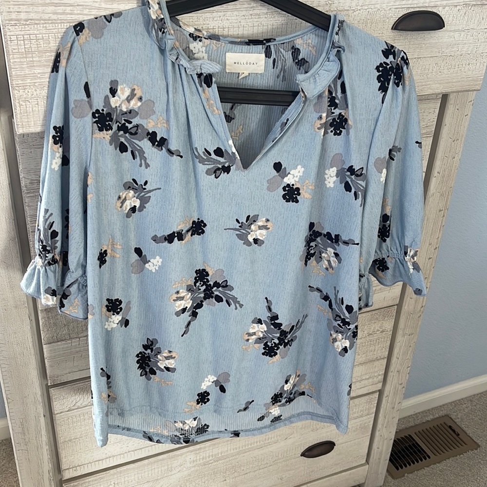 Size Small Melody’s floral print blouse.
